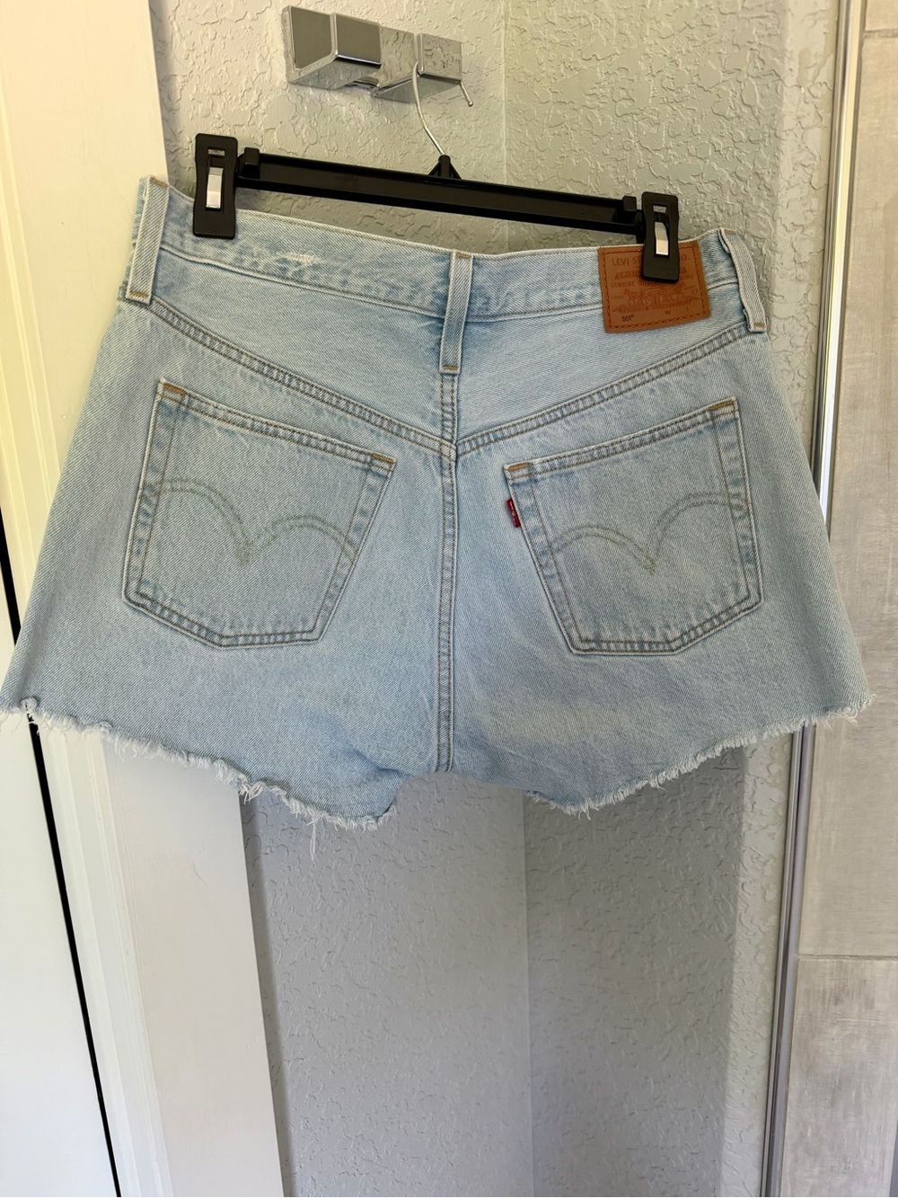 Levi's Light Blue Cutoff Denim Shorts with Frayed Hem